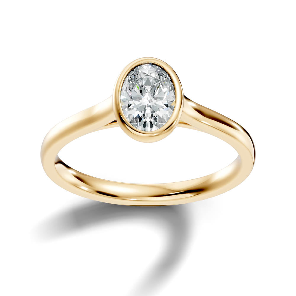 .75 Ct. Oval Diamond Solitaire Ring with Bezel Setting (b9-b)