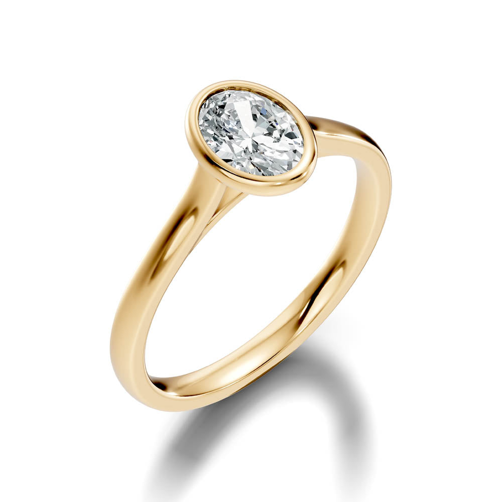 .75 Ct. Oval Diamond Solitaire Ring with Bezel Setting (b9-b)