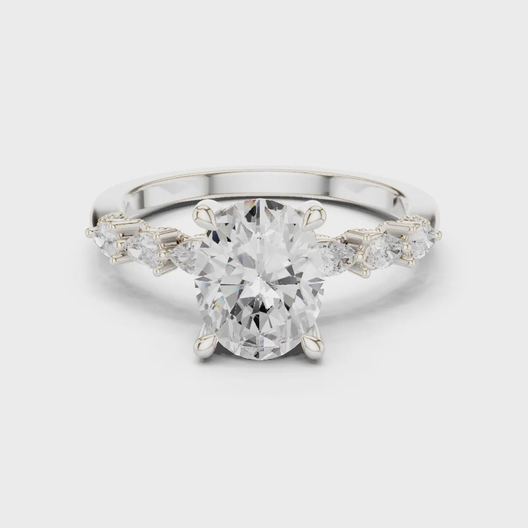 2.32 Ct. Classic Oval Diamond Ring with Pear Side Stones and Hidden Halo (DDLR-168 -R00843-OV)